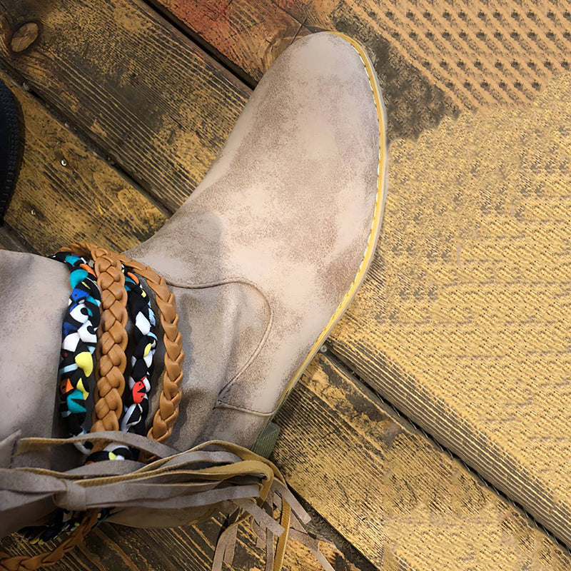 Botines vintage de estilo western tribal con borlas