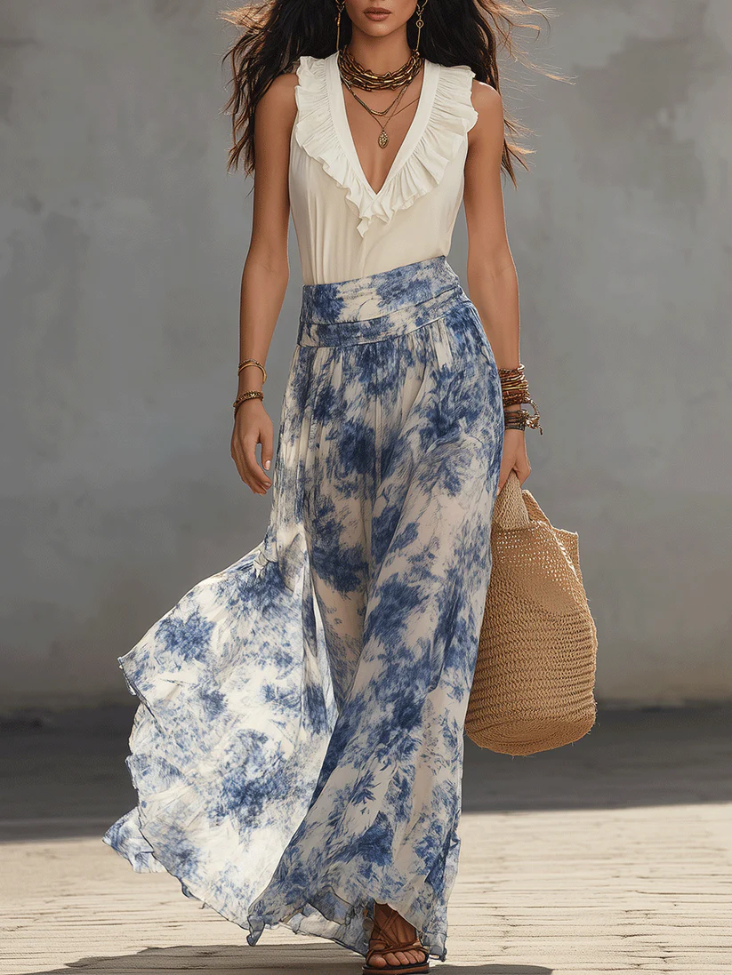 Conjunto de top con cuello en V y estampado floral azul y falda larga